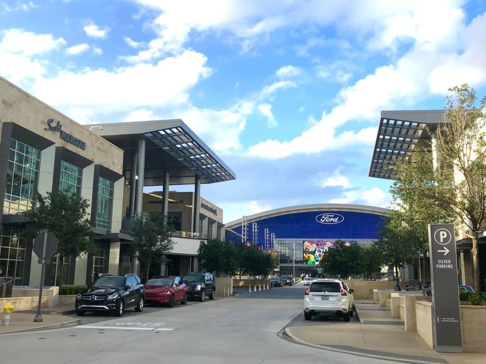 The Star in Frisco, Texas, with the domed Ford Center stadium and modern buildings of the Dallas Cowboys district.
