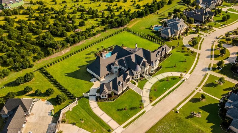 A luxury estate with a pool and manicured grounds in North Texas.